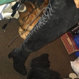 High knee black boots size 8.
